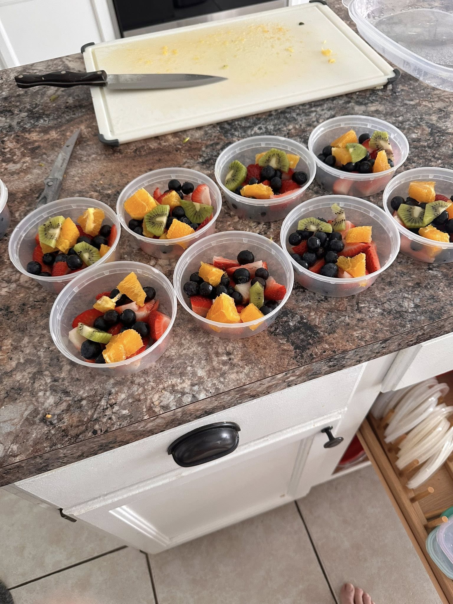 Fruit prepped in small deli containers. 